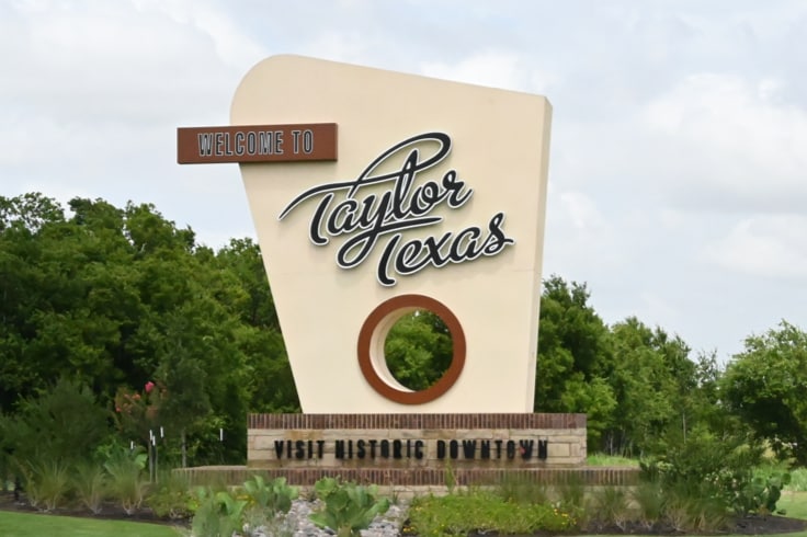 A picture of a sign on the fab in Taylor, Texas