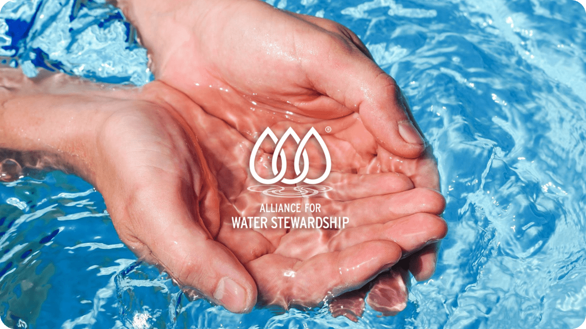An image of two hands holding water in clear water and the Alliance for Water Stewardship logo.